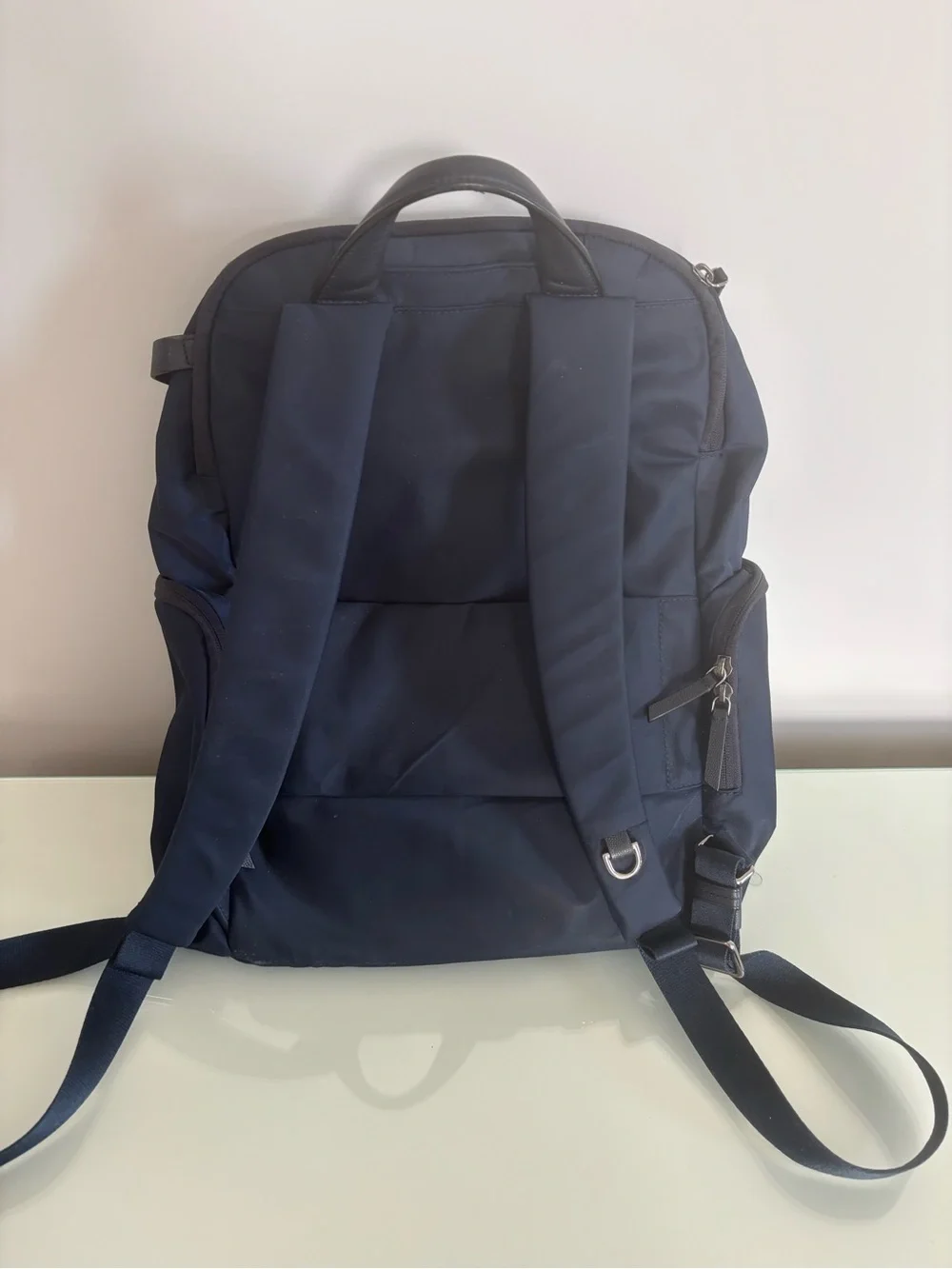 Tumi Navy Blue Men's Backpack with Silver Hardware
